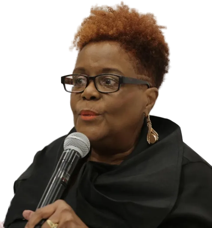 Psalmist Audrey Lewis, founder of the Real Girlfriends Network, speaking into a microphone